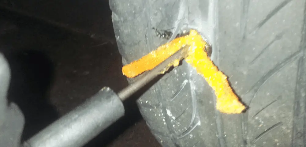 Tire being plugged