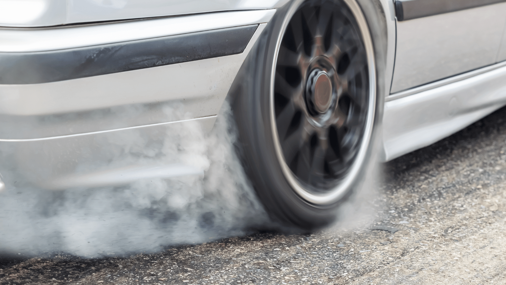 tire revving with smoke